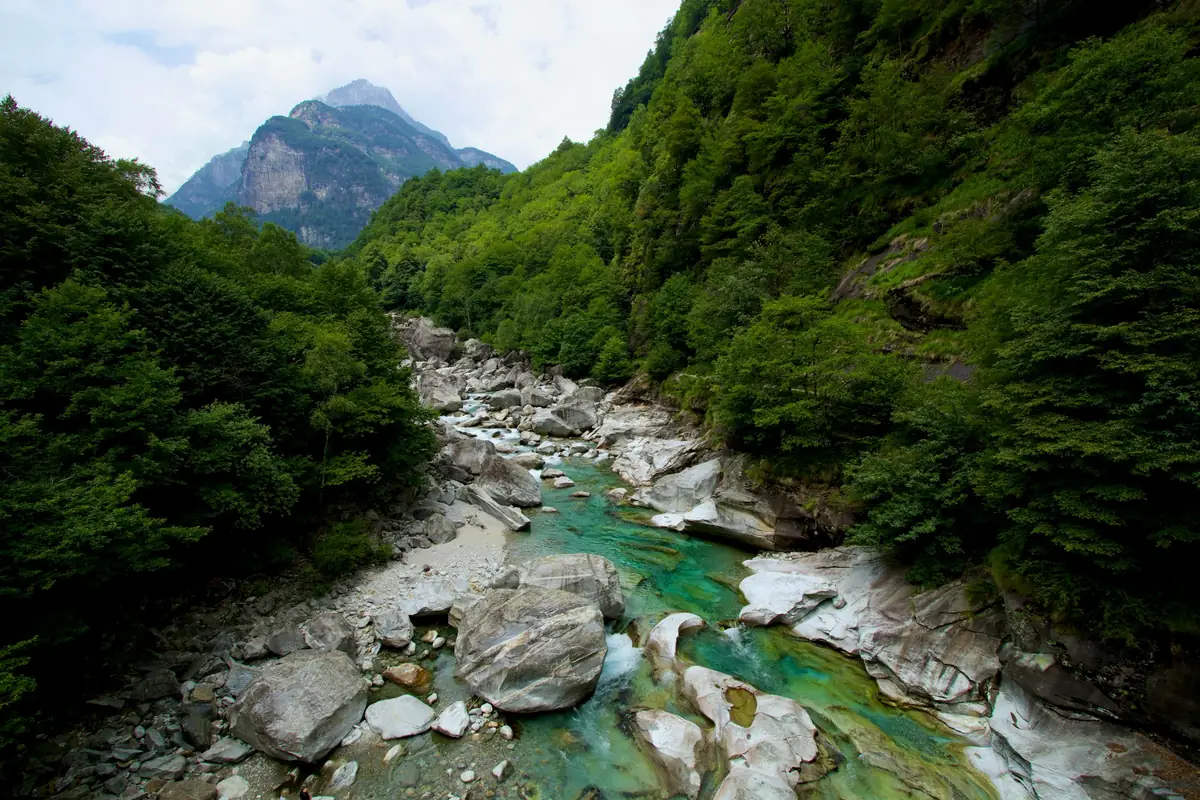 The Verzasca river's clear green water between the rocks